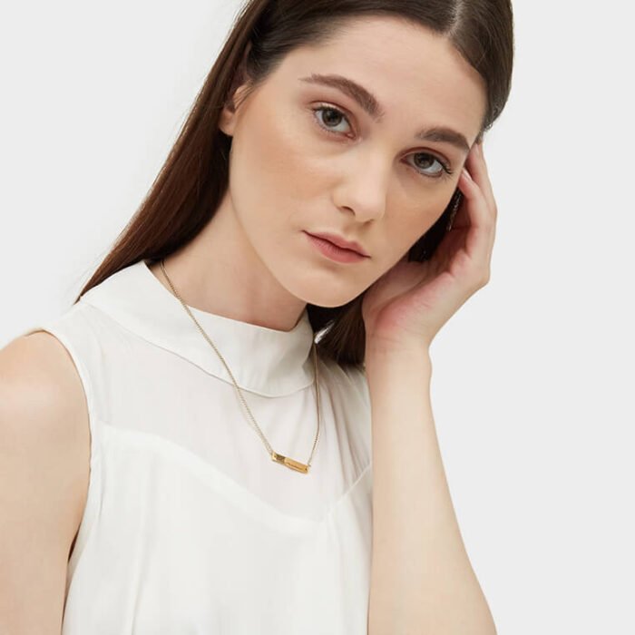 Model gold bar necklace